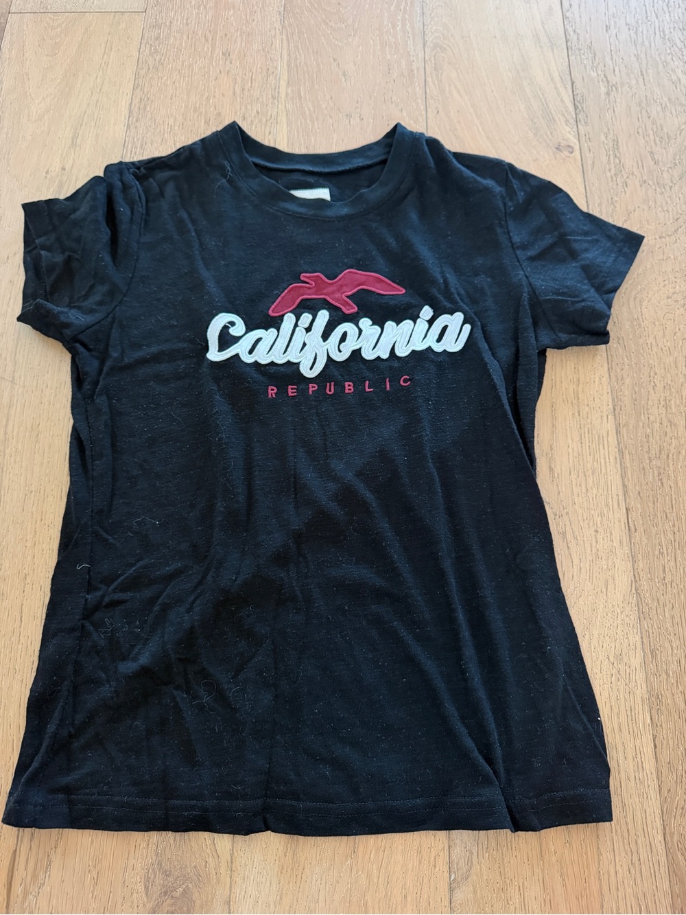 Reflex Black Graphic "California" Tee with White Script and Red Accent